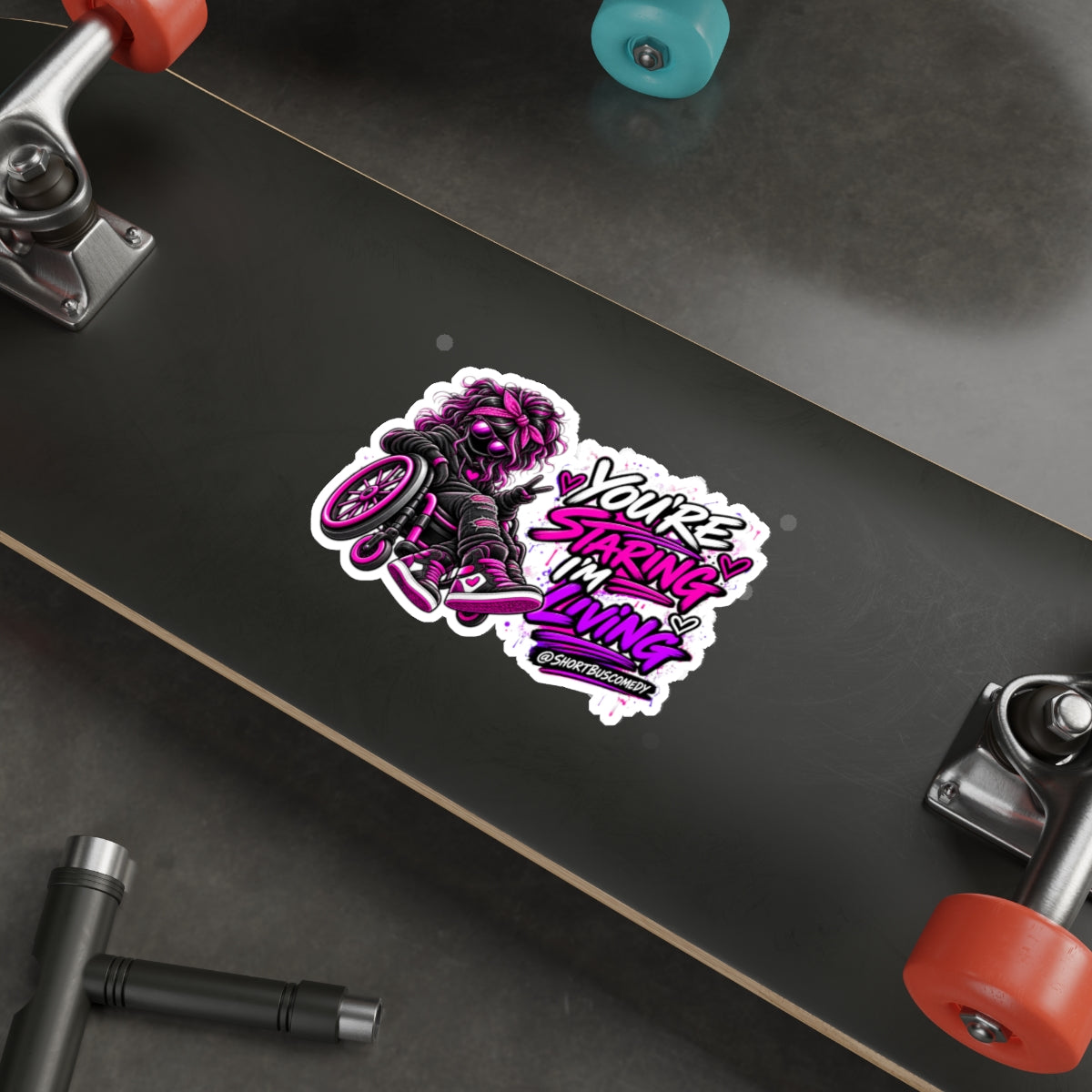 “You’re Staring I’m Living” Die-cut Wheelchair Pride Sticker (Neon Pink & Purple)